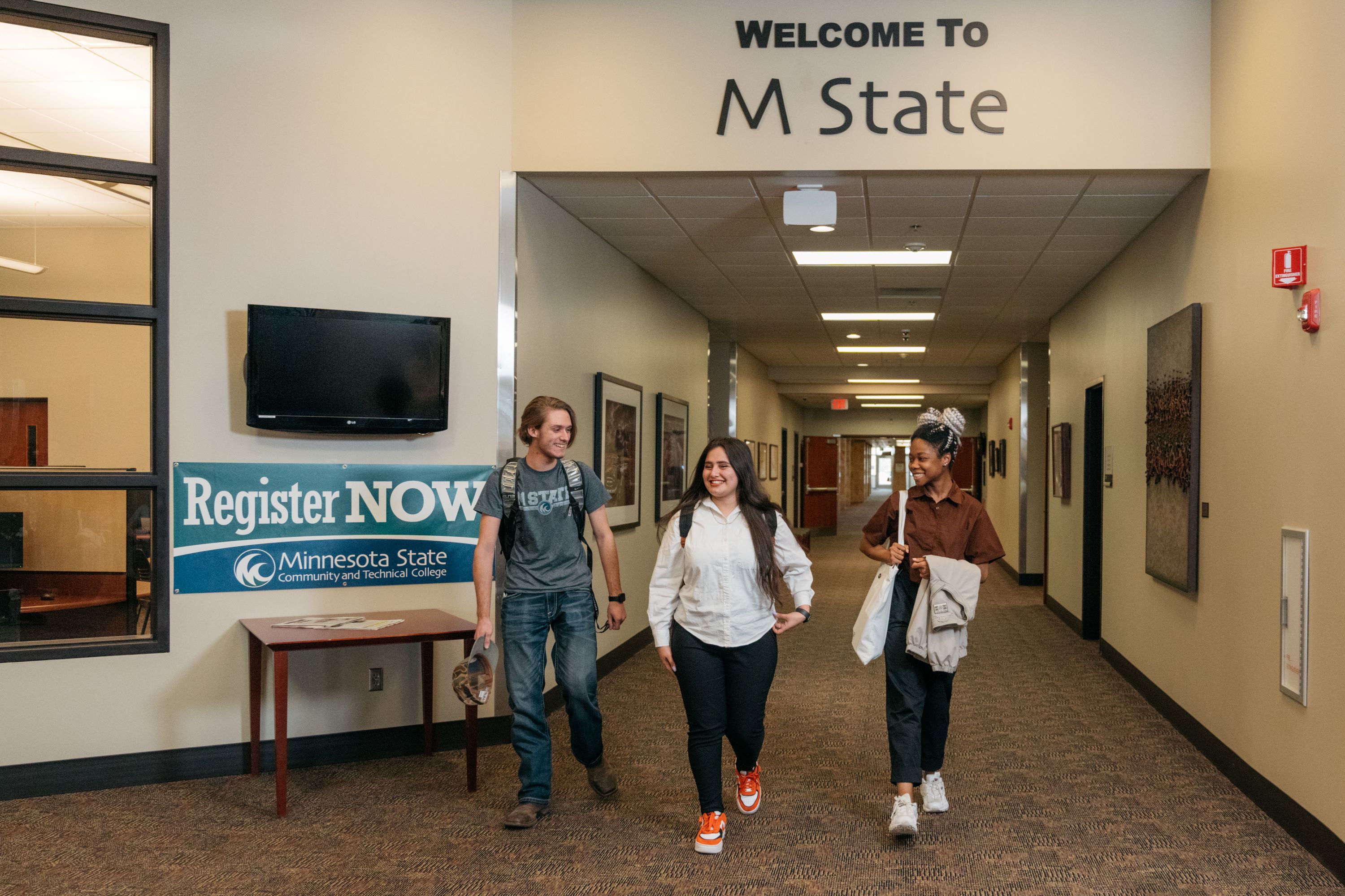 STudent walk down an M State hallway