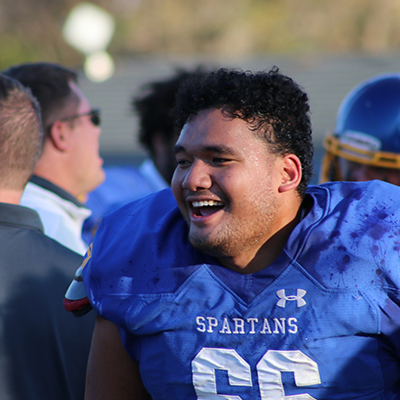 an M State football player