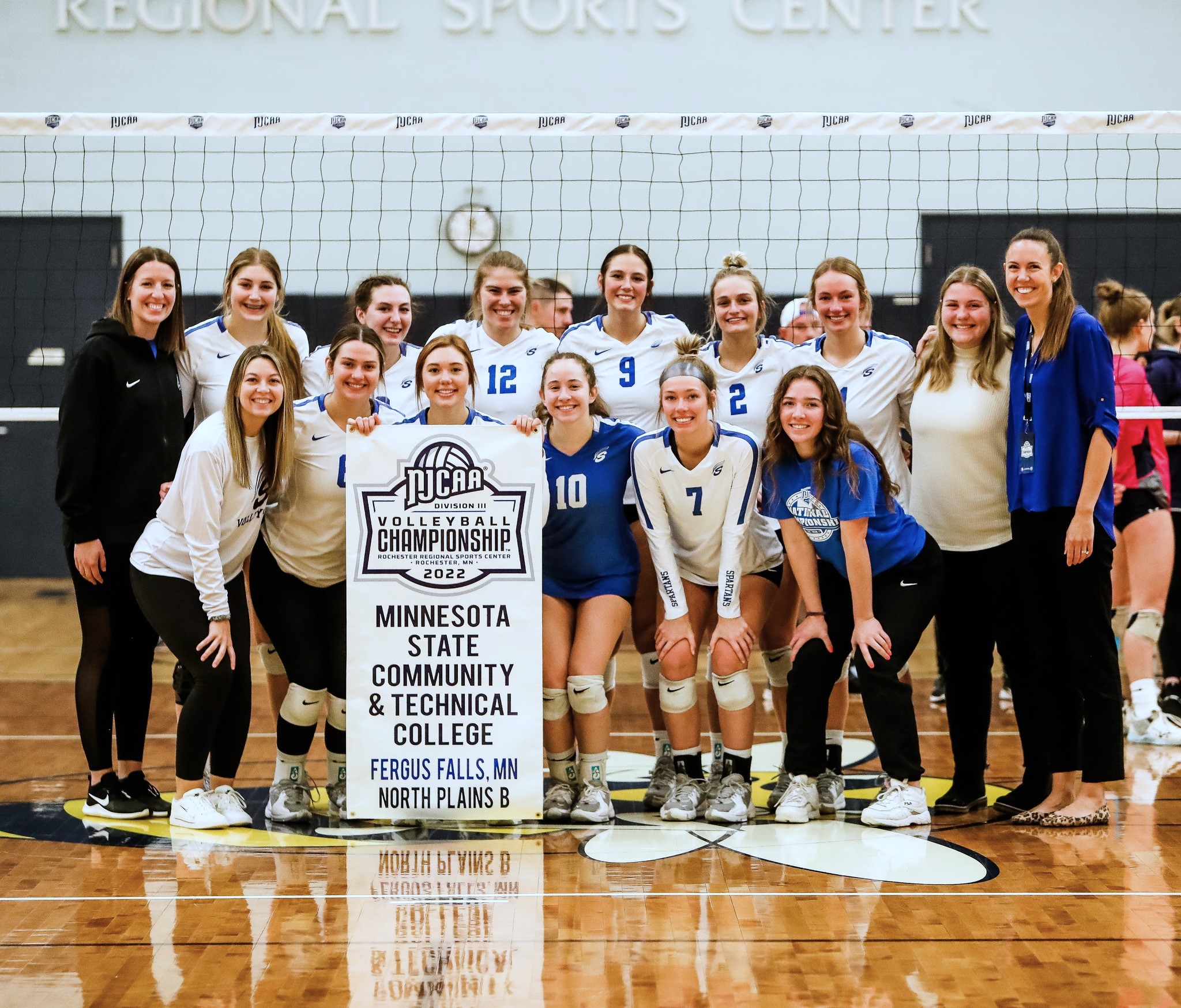 Head Coach Abby Crowser, far right, with the 2022 Lady Spartans Volleyball team after their fifth place win at nationals.