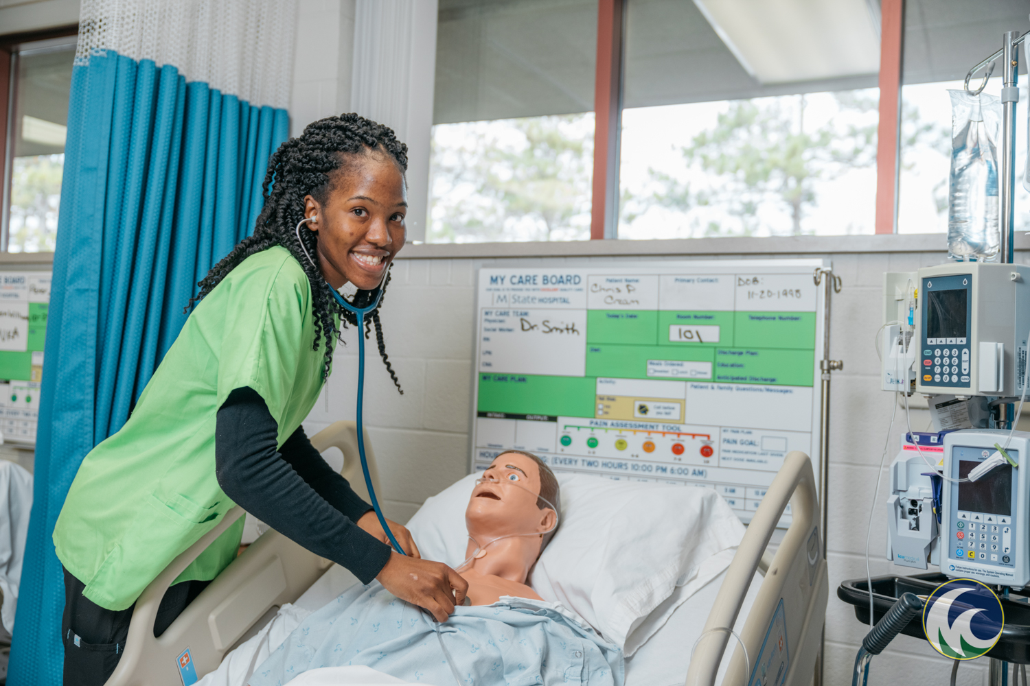 A M State Nursing student poses in the lab.