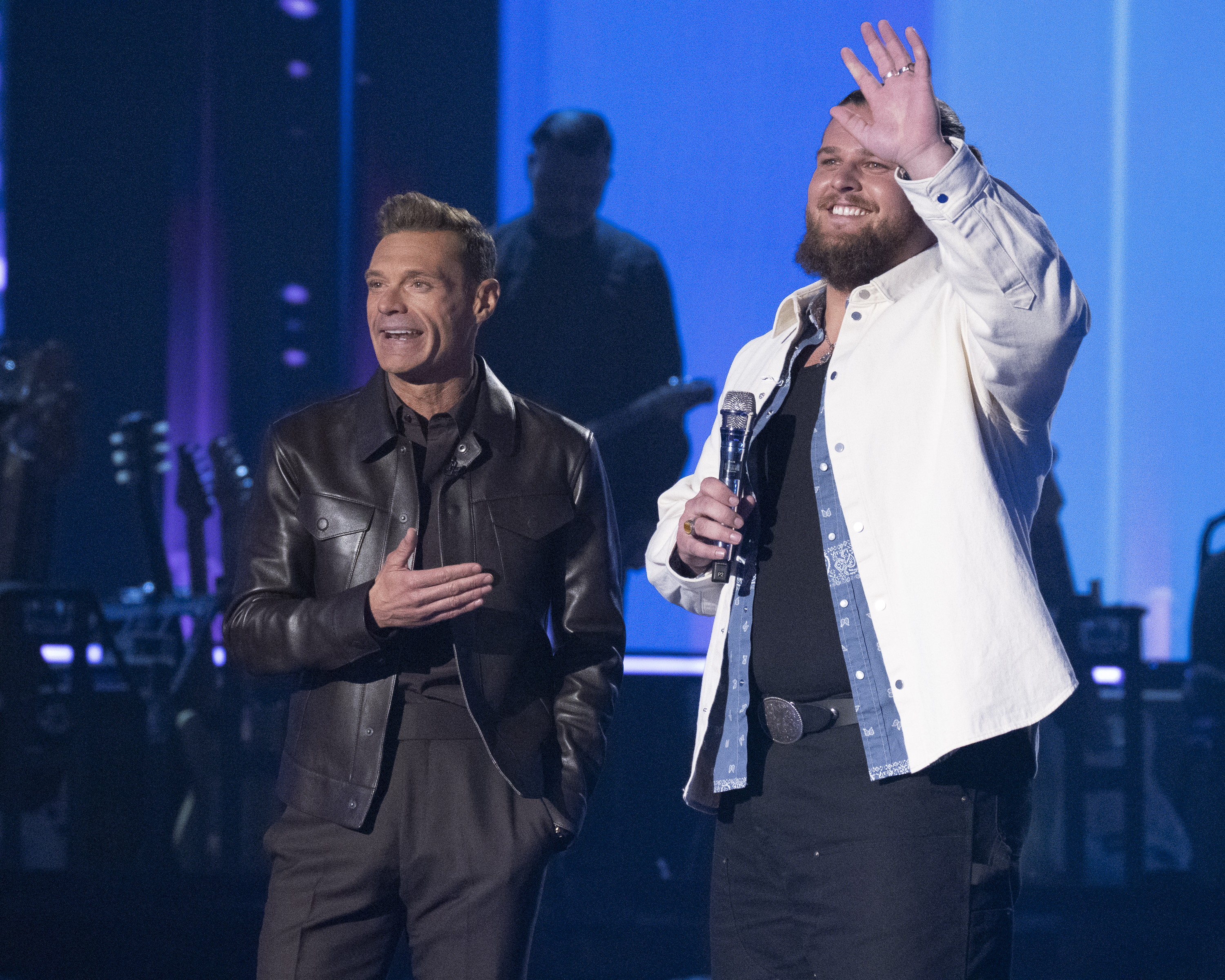 Chris Tungseth on the stage of “American Idol” with host Ryan Seacrest during the Apri 27 show on ABC. (Disney/Eric McCandless/American Idol Press Photo)