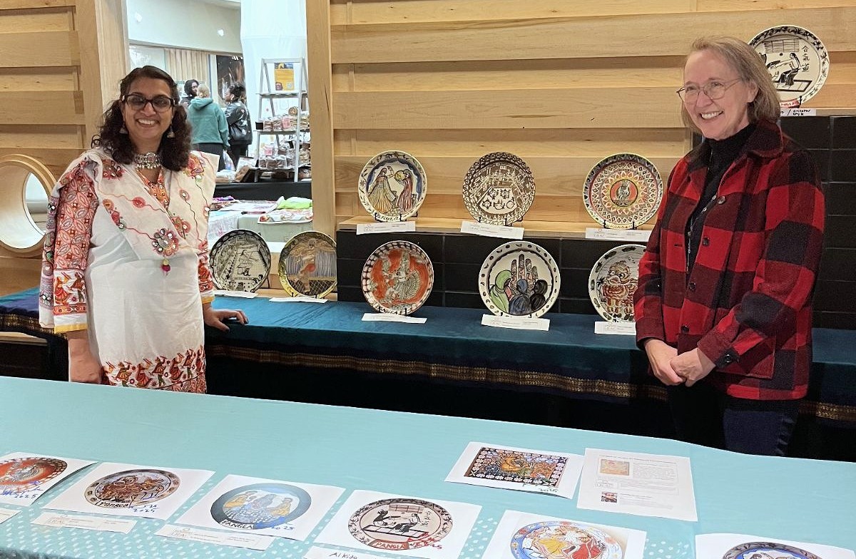 M State Chemistry Faculty Manjusha Saraswathiamma, left, and Ceramics Faculty Lori Charest at the 2025 Pangea: Cultivate our Cultures festival in Moorhead. The two collaborated this year on a creative project exploring cross-cultural motifs an artistic expression in clay.