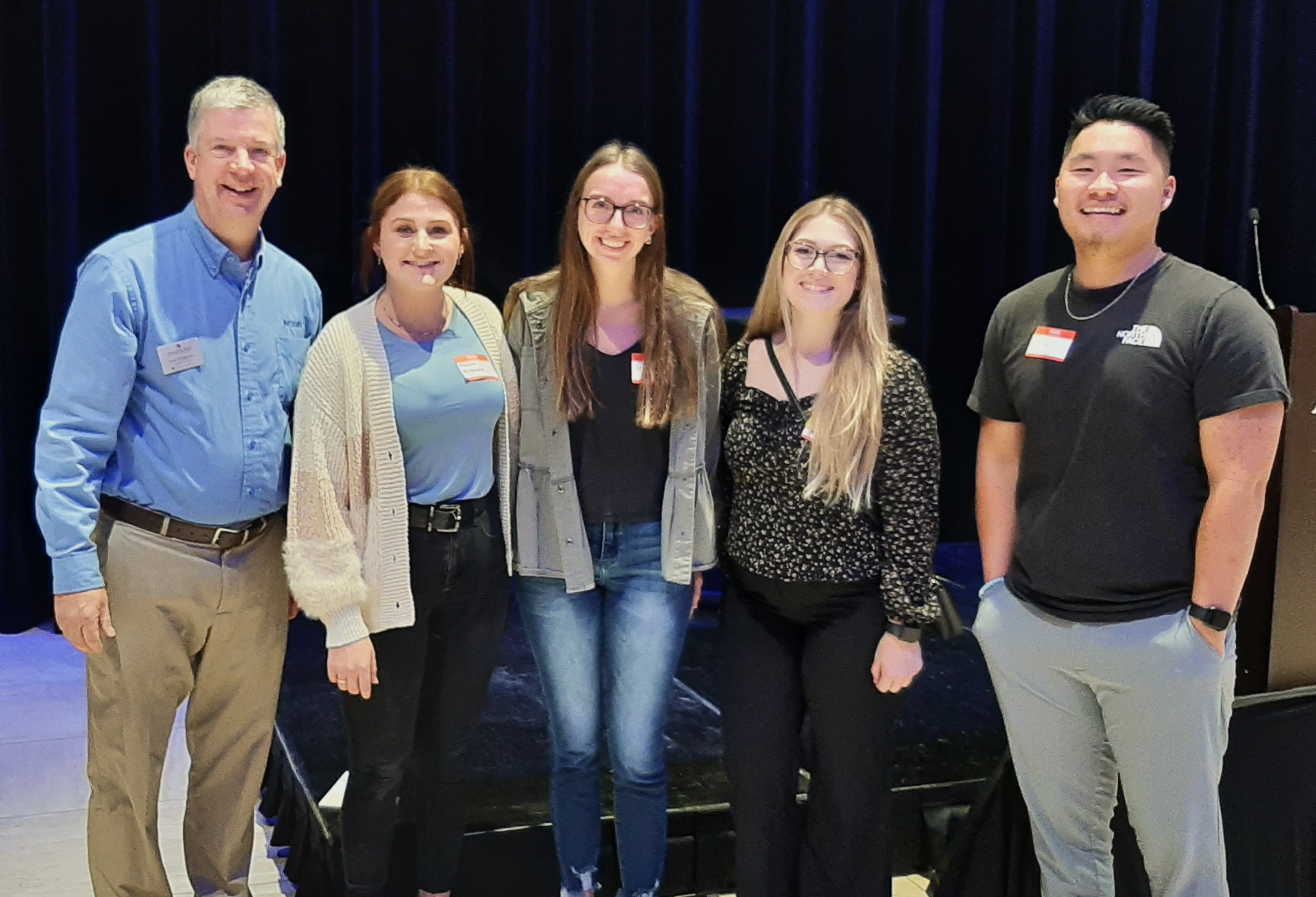 M State SHRM student chapter members Kaylee Maendel, Raenah Kaisner, Katie Monk and Sam Johnson, left to right, with chapter advisor and M State Human Resource Faculty member Loren Haagenson, far left.
