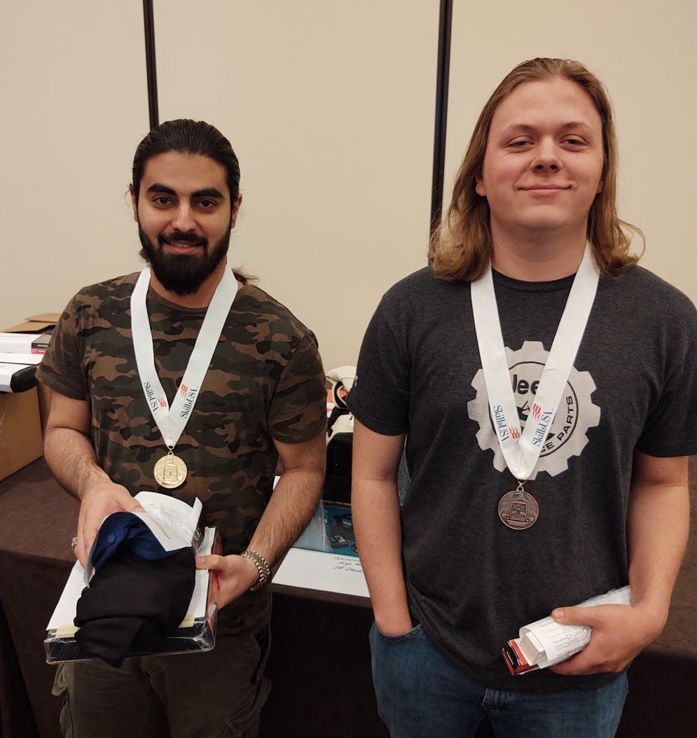 M State Automotive Service Technology students Madyan Khidir, left, and Isaiah Specht were both top performers in the 2022 SkillsUSA Minnesota State Championships, held in early April. Khidir took first place, and Specht took third.