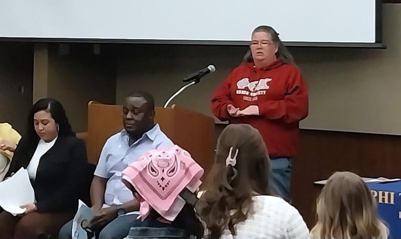 Nicole Sorby shares her story during the PTK induction ceremony.