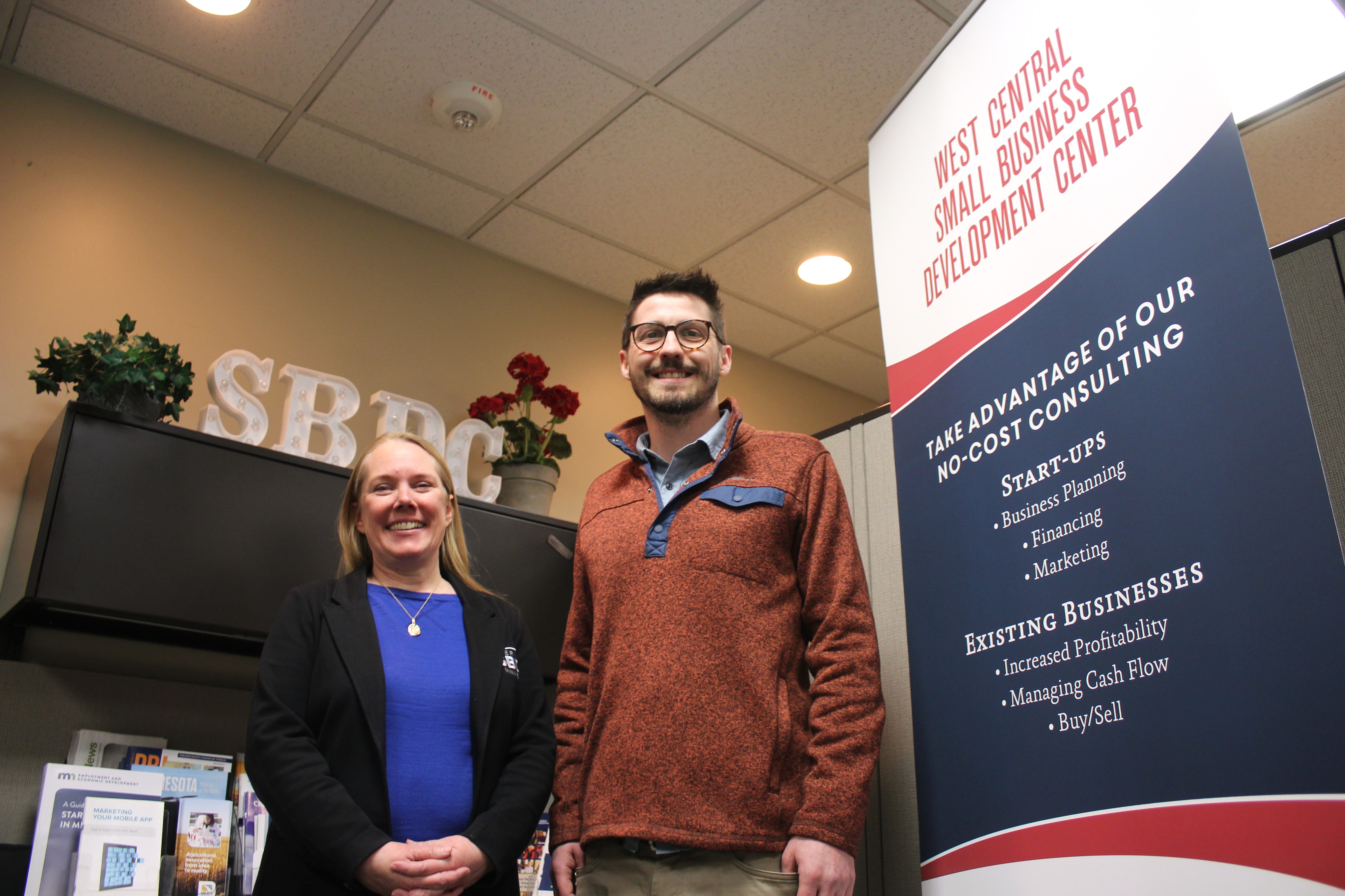 Ian Carlstrom and Amy Anderson, the new directors of the SBDC, stand inside their Moorhead office