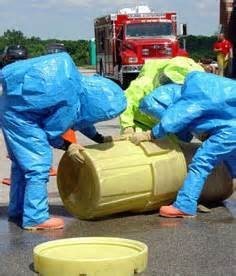 People handling hazardous waste