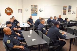 Fire officers in classroom