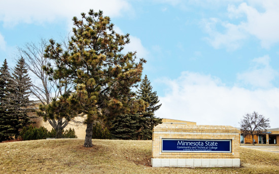 An exterior photo of M State-Detroit Lakes with an M State sign out front