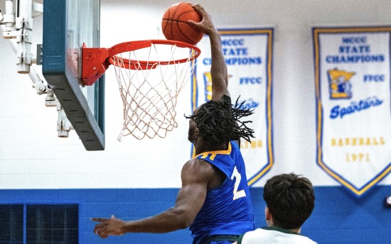 Foday Sheriff makes a slam dunk during a basketball game at M State in the 2024-2025 season.