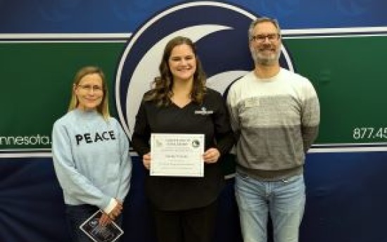 Kim Gould, Shelby Franke and Tom Dubbels at a "Realize Your Dream" scholarship award ceremony.