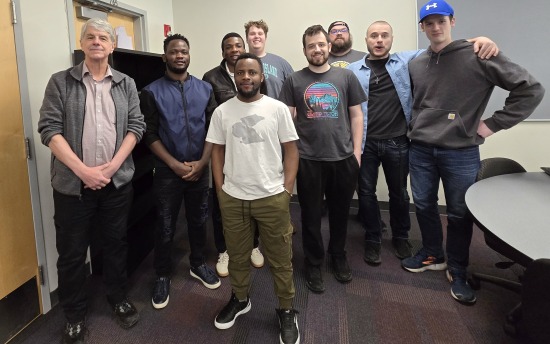 Group photo of the 2026 M State/MSUM Collegiate Cyber Defense Competition team.