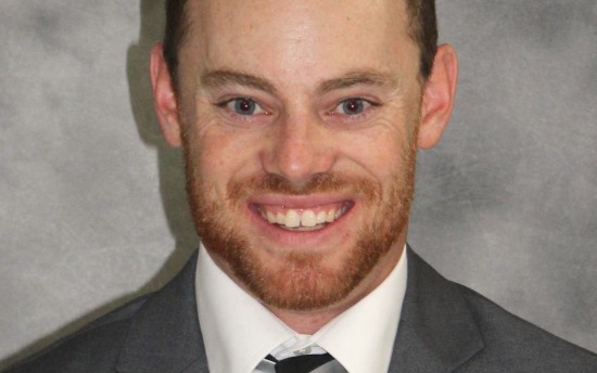Dalton Parks, M State's new head baseball coach, smiling into the camera