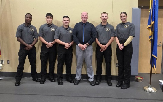 In the photo, from left to right, are: Lembusa Nakyoyo, Isai Valdez, Jose Perez, Criminal Justice Program Coordinator and Faculty Jeff Nelson, Loden Clark and Maddison Hayes. 