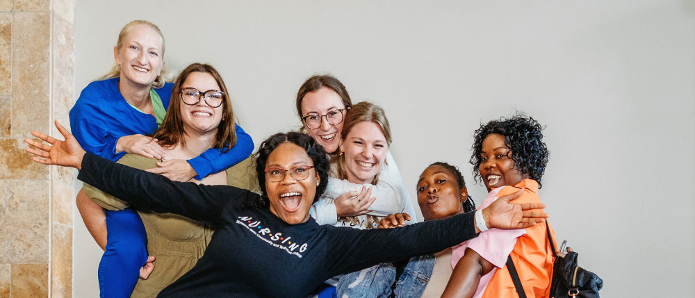 Group of women smiling and happy.